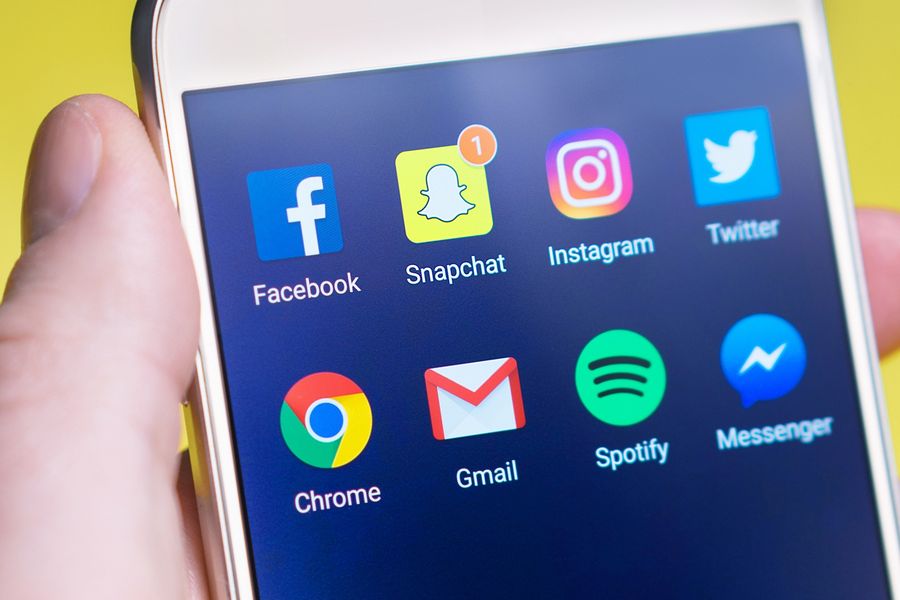 Marketing analyst reviewing social media performance data